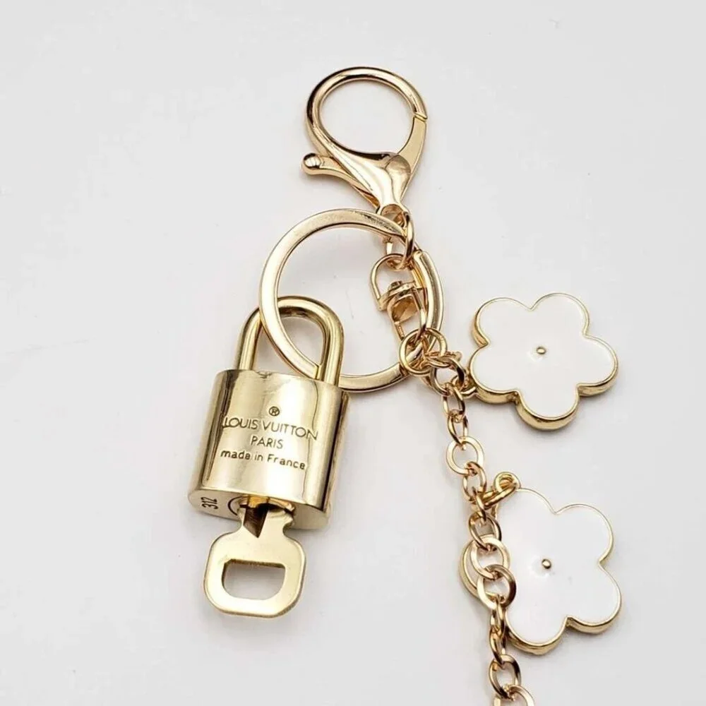 Authentic Louis Vuitton Lock & Key with unbranded Flower Bagcharm, Keycharm